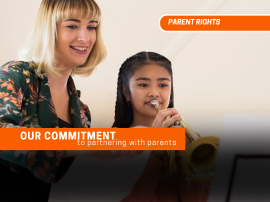  Image of a teacher working with a middle school musician playing the french horn